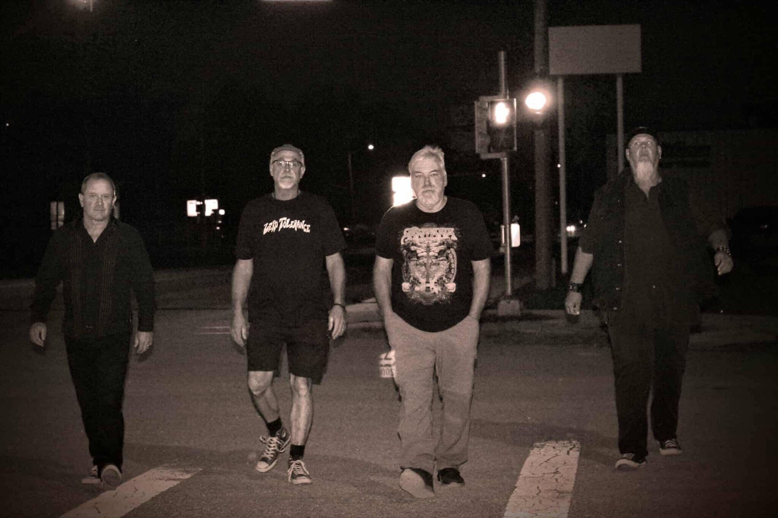 The band walking together at night