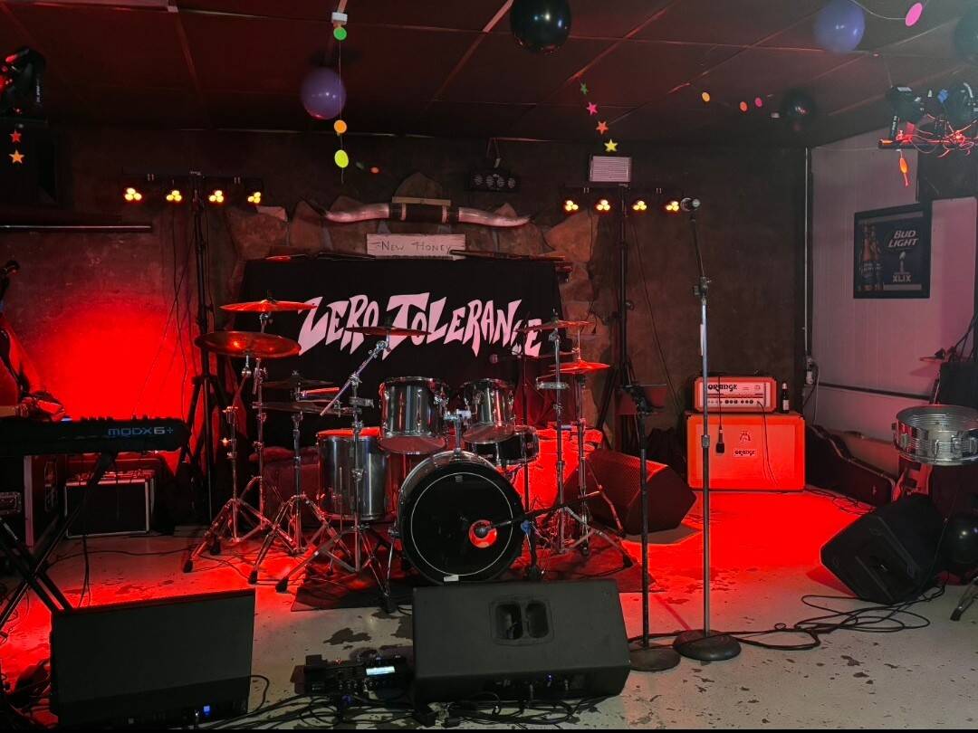 The Zero Tolerance stage lit in red